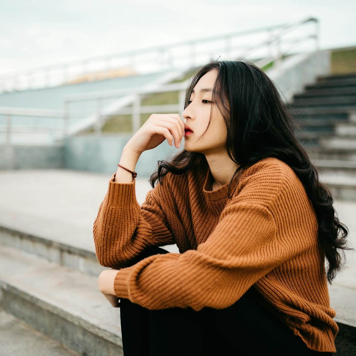anthony-tran-3B6RfJQKBEM-unsplash-1182sq A woman in deep thought. Our thoughts are powerful. We must use them wisely.